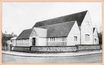 St John&rsquo;s in 1938 seen from the street corner, with no tower or spire above the roofline.